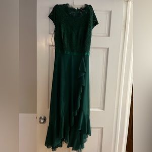 Forest green semi-formal dress. Fits as expected based on stock photo.